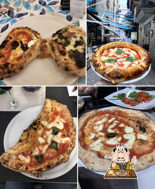 Pizza napoletana e scorcio del vicolo davanti al ristorante 7Soldi