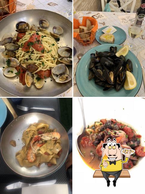 Specialita di mare, spaghetti con vongole, cozze e piatti di pesce di 7Soldi
